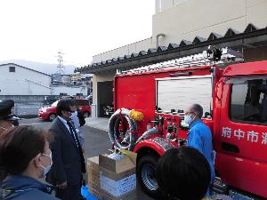 3.29目崎町（岩谷一部）への消防ポンプ車の貸与式