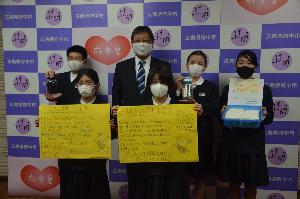 12.18明郷学園による新型コロナウイルス感染症に関する募金活動、予防啓発の表敬訪問